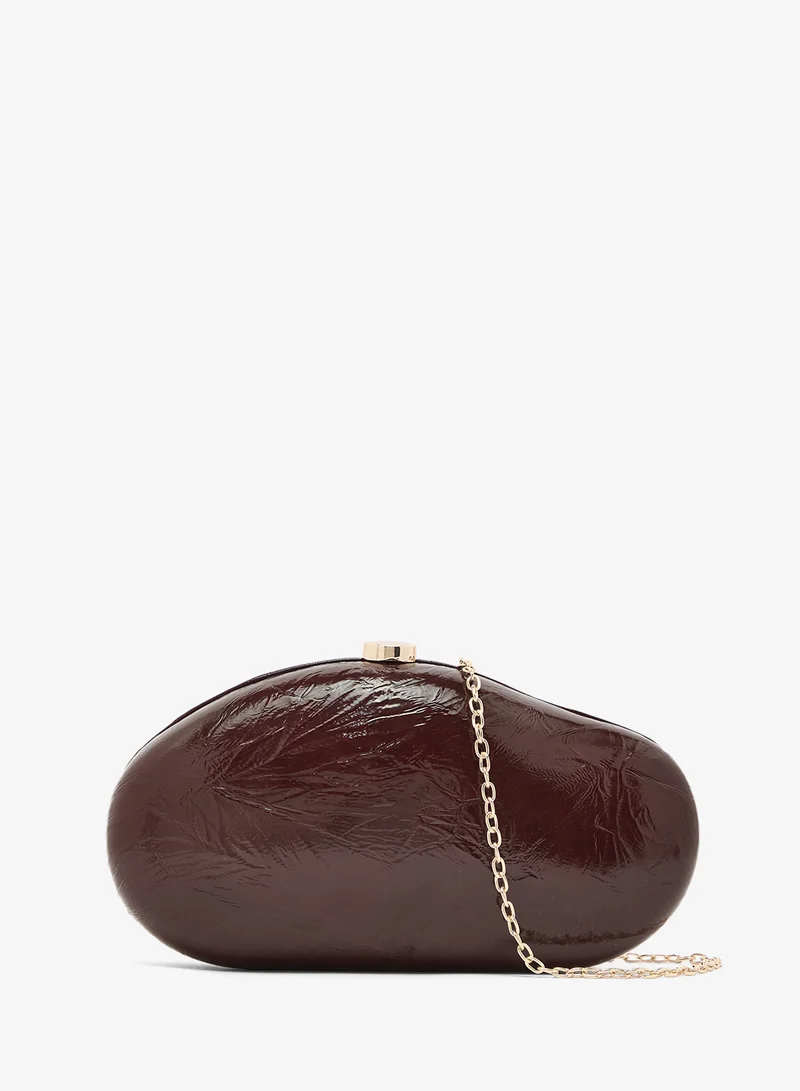 Oval Statement Clutch With Gold Accent And Strap